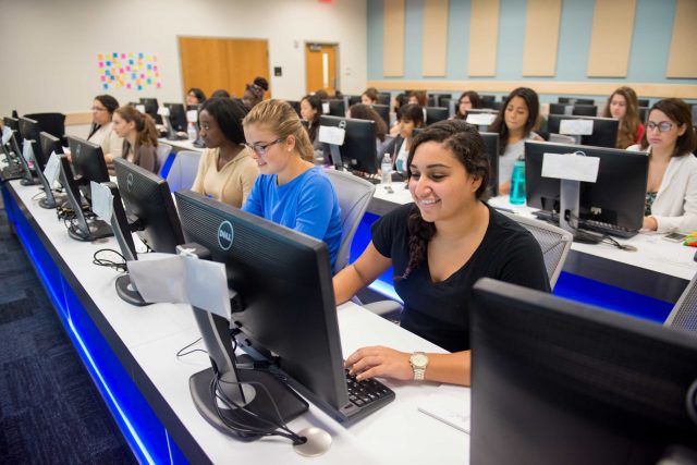 FIU Students in a lecture and lab.